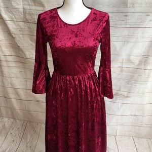 Garnet red velvet dress with bell sleeves